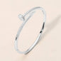 CZ Stone Paved Nailhead Accent Hinged Bangle Bracelet: Rhodium