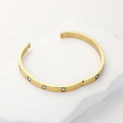 Stainless Steel Crystal Embellished Bangle Bracelet
: Gold